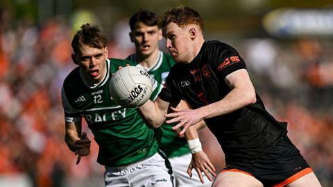 Conor Turbitt runs at the Fermanagh defence