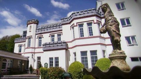 Stradey Park Hotel hotel with an ornate garden in front