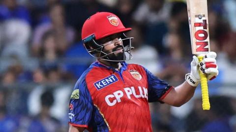 Punjab Kings' Prabhsimran Singh celebrates after reaching his half-century