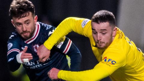 Aidan Connolly (left) in action for Raith Rovers against Lewis Strapp of Morton during a SPFL Trust Trophy match between Raith Rovers and Greenock Morton