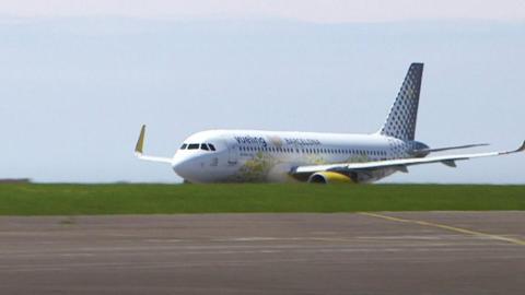 Plane at Cardiff Airport runway