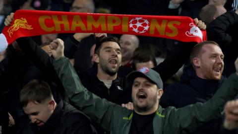 Liverpool fans celebrate their win over Aston Villa