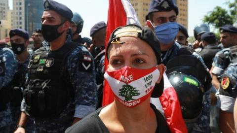 Woman wearing a face mask at an anti-government protest in Beirut (12/08/20)