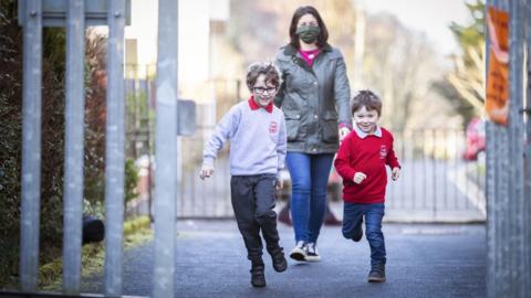 parent and pupils return to school