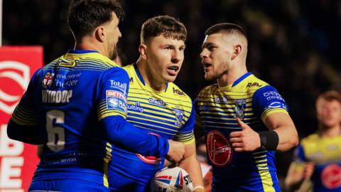 Gareth Widdop and George Williams celebrate a try