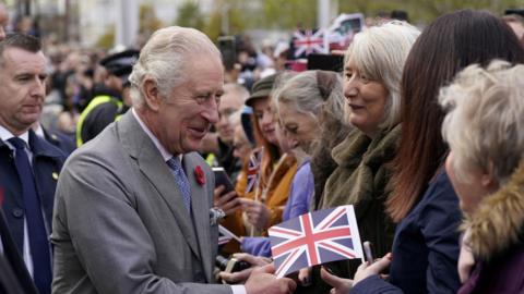 Britain's King Charles III greets members of the public while arriving for a reception with young leaders from across Bradford, at Bradford City Hall