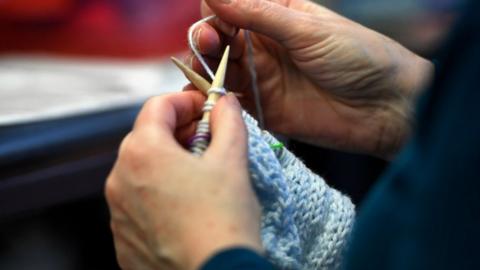 Woman knitting