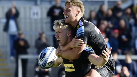 Josh Hodge celebrates his hat-trick