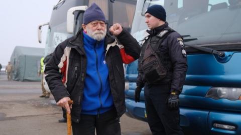 Pro-Russian rebels - who were made prisoners - are seen before a prisoner exchange between Ukraine and pro-Russian rebels near the Mayorsk checkpoint on December 29, 2019.