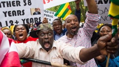 Abdou Razak (C) of Togo demonstrates with others against President Faure GnassingbÃ© in Dag Hammarskjold Plaza outside the UN in New York on September19, 2017