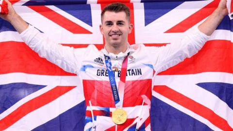 Max Whitlock on the podium after winning gold at Tokyo 2020