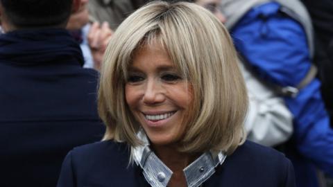 Brigitte Trogneux, wife of French presidential election candidate for the En Marche movement Emmanuel Macron leaves a polling station after casting her vote in Le Touquet, northern France, on 7 May 2017,