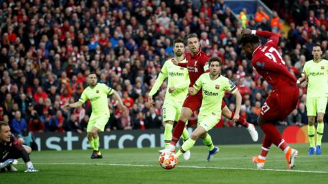 Divock Origi scores