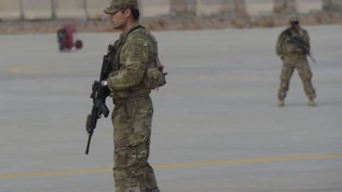 A US soldier stands guard at Kandahar Air base in Afghanistan on January 23, 2018