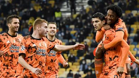 Alvaro Morata (second from right) celebrates his goal with team-mates