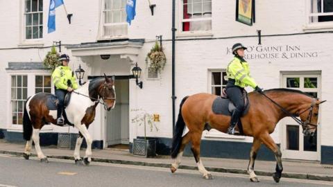 Mounted police patrolling