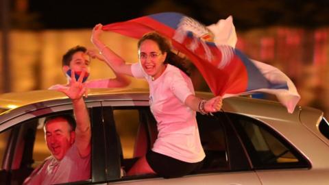 Opposition supporters celebrate election results in Podgorica, Montenegro, 31 August
