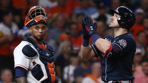 Houston Astros catcher Martin Maldonado and Atlanta Braves centre fielder Adam Duvall