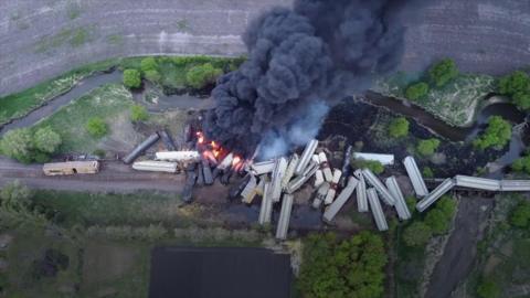 Train derails and explodes into flames