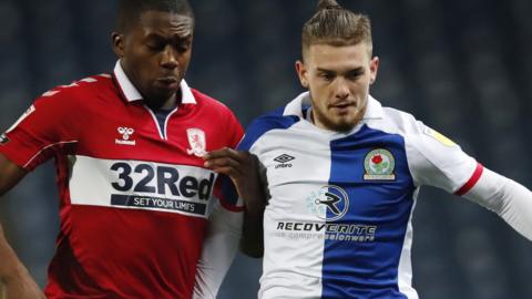 Anfernee Dijksteel (left) and Harvey Elliott battle for the ball