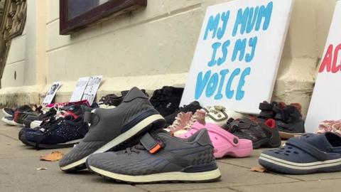 Shoes laid outside Sefton Council meeting