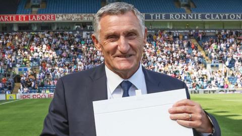 Tony Mowbray is presented with his Blackburn Rovers Honour Cap at Ewood Park before a game against Birmingham City in August 2025