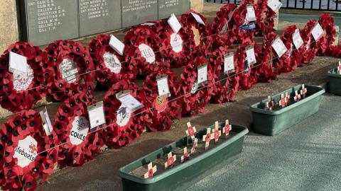 Poppy wreathes at the Douglas war memorial