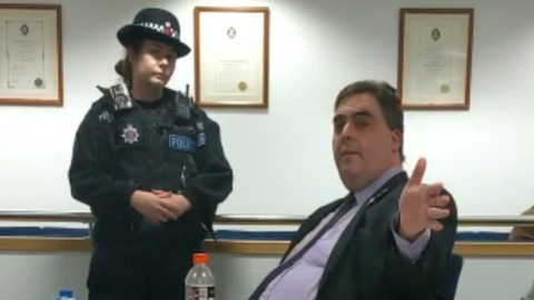 Kerry Smith and a police officer in Basildon