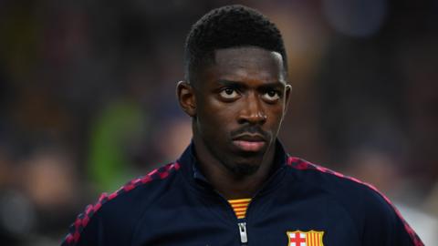 Barcelona winger Ousmane Dembele looks on