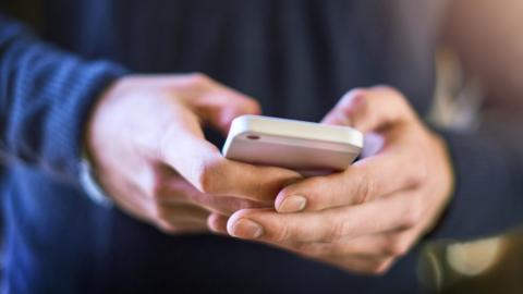 A man using a mobile phone