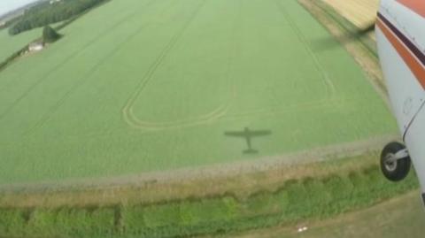 Aerial view of a field from an aircraft