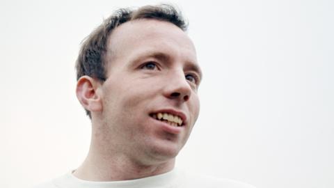 Nobby Stiles looks to the right