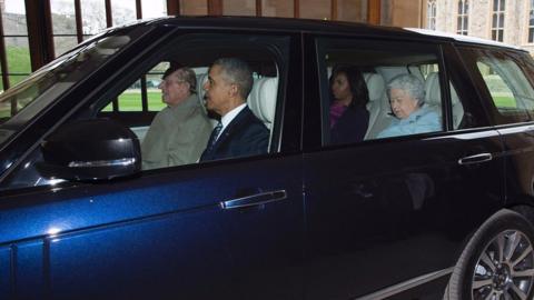 Duke of Edinburgh driving a car with the Queen, Barack Obama and Michelle Obama