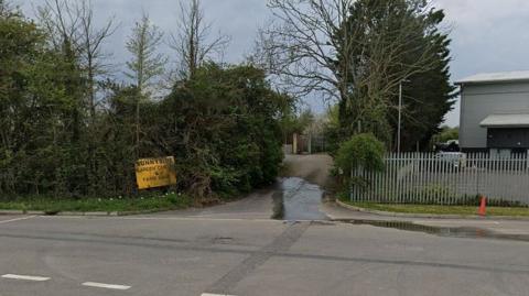 Road sign at entrance to now derelict Sunnyside Nurseries