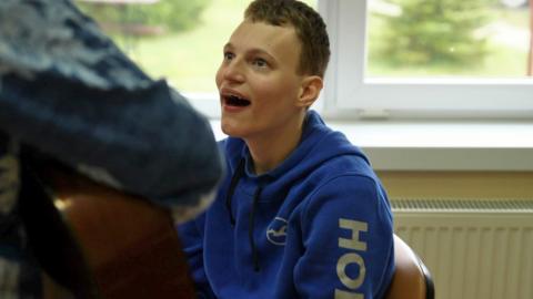 Roman, 20, is being taught at a school in Poland - it's the first time in his life his been able to access an education