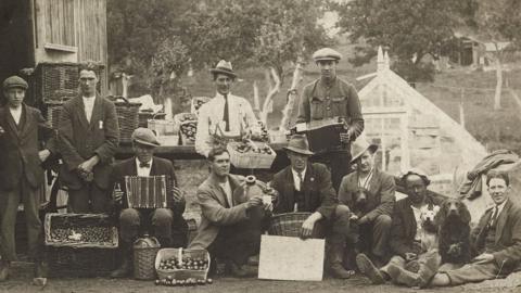 The Jinks family displaying their produce