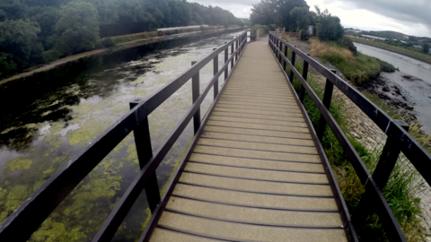 The greenway suspended on a wooden walkway