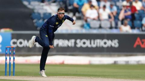 George Drissell of Durham is bowling during the Metro Bank One Day Cup match between Durham County Cricket Club and Somerset