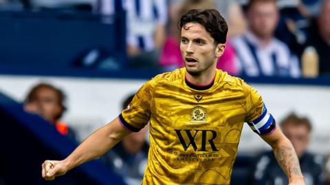 Lewis Travis in action during Blackburn Rovers' season opener at West Bromwich Albion on Saturday