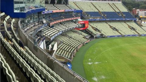 Overnight rain at Edgbaston left puddles on the outfield