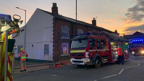 Fire engines at fire at derelict pub