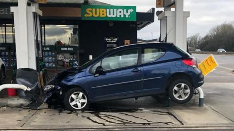 Car crashed at petrol station
