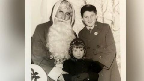 Colin Chinnock with Father Christmas and council Gillian