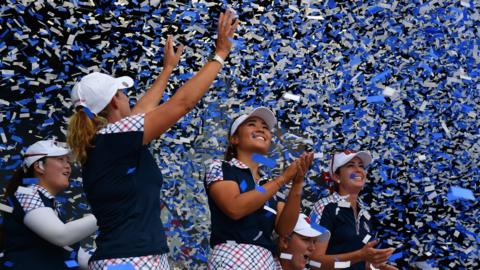 The United States celebrate winning the Solheim Cup