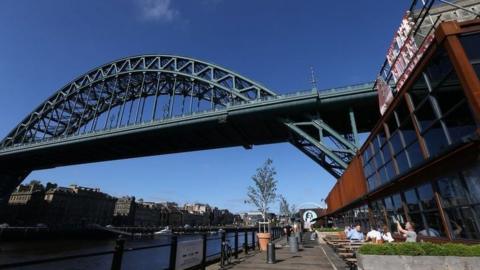 By the River Brew Co under the Tyne Bridge in Gateshead, image taken before the pandemic