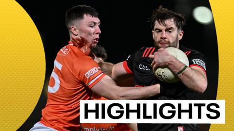 Armagh and Louth players tussle for the ball