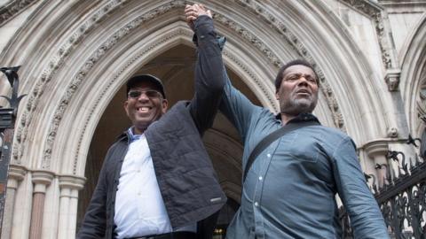 Paul Green (left) and Cleveland Davidson outside the Royal Courts of Justice in London.