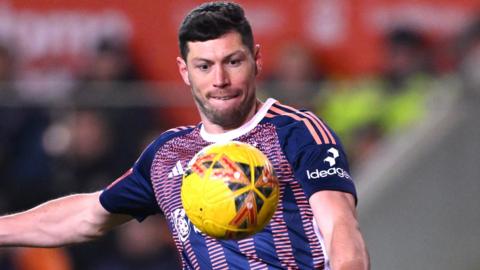 Nottingham Forest player Scott McKenna in action during the Emirates FA Cup Third Round Replay match between Blackpool and Nottingham Forest at Bloomfield Road