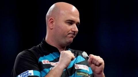 Rob Cross celebrates during the 2023 PDC World Darts Championship