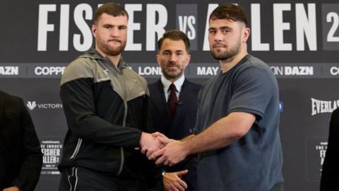 Johnny Fisher and Dave Allen shake hands